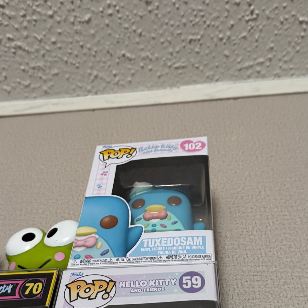 Funko Pop! Tuxedosam and Hello Kitty Figures - Blue and Green